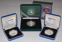 Lot 105 - Three cased silver proof coins; The Queen...