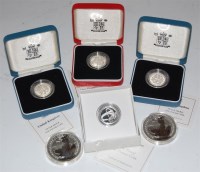 Lot 106 - Four cased silver proof one-pound coins...