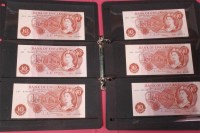 Lot 143 - Great Britain, folder of 33 ten shilling bank...