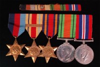 Lot 202 - A WW II medal group to include 1939-45 Star,...