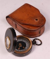 Lot 205 - A post WW II military marching compass stamped...