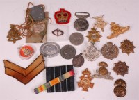 Lot 254 - A large collection of assorted military badges,...