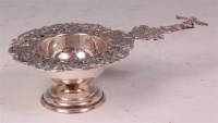 Lot 496 - A circa 1900 Dutch silver PLATED tea strainer...
