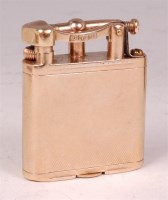 Lot 592 - A Dunhill 9ct gold pocket cigarette lighter,...