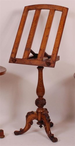 Lot 933 - A mid-Victorian carved oak music stand, having...