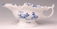 Lot 430 - An early Worcester porcelain sauceboat, relief...