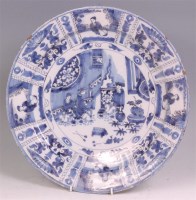 Lot 441 - An early 18th century English Delft charger,...