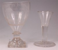 Lot 455 - An 18th century drawn trumpet dram glass,...