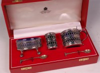 Lot 513 - A modern Asprey & Co cased silver three piece...