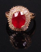 Lot 523 - A contemporary 14ct yellow gold ruby and...