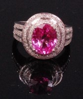 Lot 525 - A contemporary 14ct white gold pink sapphire...