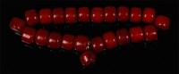 Lot 548 - A beaded cherry amber necklace, comprising 23...