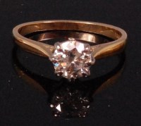 Lot 560 - A ladies 18ct gold diamond solitaire ring, the...