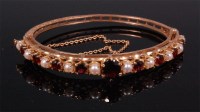 Lot 571 - A Victorian style 9ct gold garnet and seed...