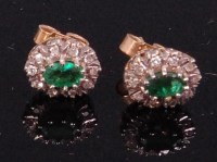 Lot 575 - A pair of 9ct gold emerald and diamond set ear...