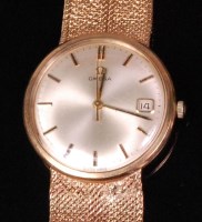 Lot 583 - A 1960s gents Omega 9ct gold cased bracelet...