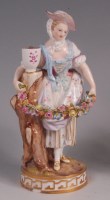 Lot 322 - A Meissen porcelain figurine 'Flower Girl',...