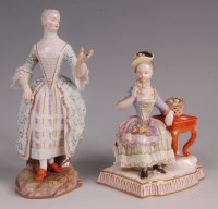 Lot 324 - A Meissen porcelain figure of a standing woman...