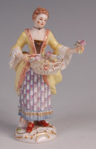 Lot 325 - A Meissen porcelain figurine 'Flower seller',...