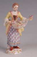 Lot 325 - A Meissen porcelain figurine 'Flower seller',...
