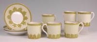 Lot 339 - A set of six Russian porcelain coffee cans and...