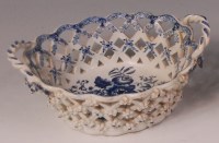 Lot 345 - A Lowestoft porcelain chestnut basket, lattice...