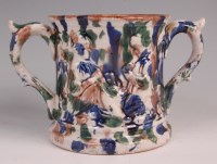 Lot 362 - A 19th century Staffordshire loving cup,...