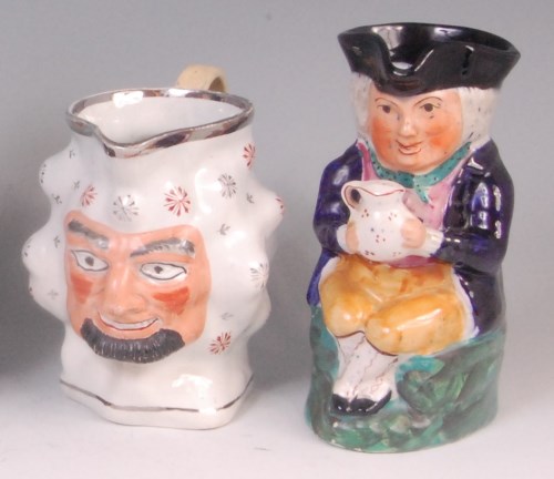 Lot 364 - A mid-19th century Staffordshire Toby jug,...