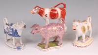 Lot 365 - A collection of four Staffordshire cow...