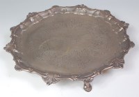 Lot 405 - A George II silver salver, having a shall cast...