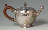 Lot 411 - A George III silver bachelors teapot, of...
