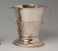 Lot 414 - A circa 1900 silver loving cup, of tapering...