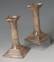 Lot 417 - A pair of Edwardian silver Corinthian column...