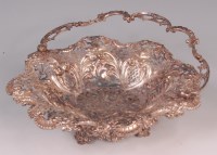 Lot 431 - An Edwardian silver and embossed cake basket,...
