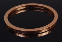 Lot 464 - An 18ct gold hinged bangle, of plain square...