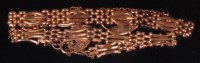 Lot 497 - A ladies 9ct gold gatelink bracelet, with...