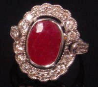 Lot 517 - A contemporary 14ct white gold ruby and...