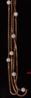 Lot 519 - A 14ct gold and opal guard chain, the fine...