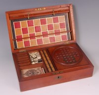 Lot 529 - A late Victorian mahogany cased fitted games...