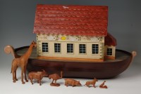 Lot 532 - A painted wooden model of Noah's Ark, having a...