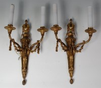Lot 534 - A pair of early 20th century gilt bronze twin...
