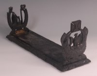 Lot 550 - A Victorian Irish carved bog oak bookslide,...