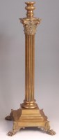 Lot 574 - A Victorian brass Corinthian column table lamp...