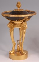 Lot 575 - A 19th century French bronze and gilt bronze...