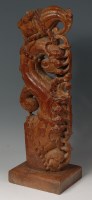 Lot 591 - A 19th century South East Asian carved and...