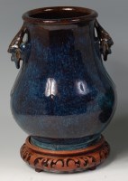 Lot 618 - A 19th century Chinese glazed stoneware vase,...