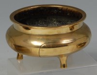 Lot 622 - A Chinese polished bronze censer, of circular...