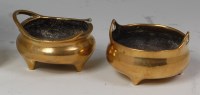 Lot 623 - A Chinese polished bronze twin-handled censer,...