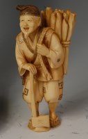 Lot 658 - A Japanese Meiji period carved ivory okimono...