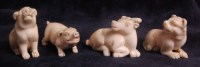 Lot 660 - Four various Japanese carved ivory netsukes,...